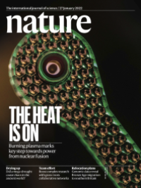 Nature cover with text "The Heat is On" and image of a metal spoon-shaped part