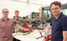 Researchers with drone