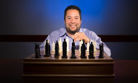 Miguel Morales-Silva at a chess board