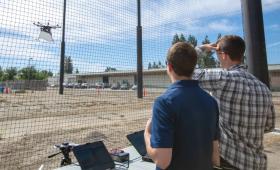 Researchers testing drones at enclosure