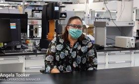 Person wearing mask in laboratory