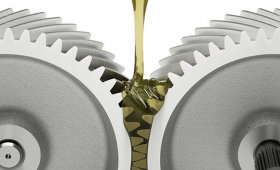 two gears moving with pouring oil