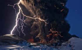 Lightining strikes erupting volcano