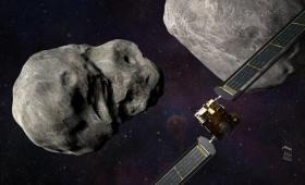 Satellite approaching an asteroid