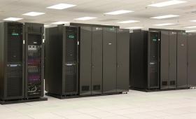 Three vertical supercomputers side by side