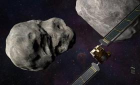 Illustration of DART spacecraft and LICIACube near asteroid just before impact 