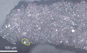 Particle A0037, a fragment from asteroid Ryugu