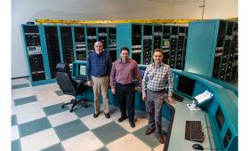 Larry Pelz, Jean-Michel Di Nicola, and John Heebner pictured in the Master Oscillator Room