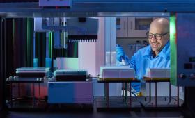 Dante Ricci with pipette in lab
