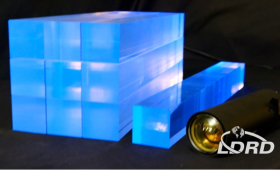 Building on more than a decade of research, LLNL materials scientists and industry partner Eljen Technology have produced plastic, lithium-6 doped scintillator “bars” (with dimensions of 5.5 cm × 5.5 cm × 50 cm) capable of detecting antineutrinos: the antimatter partner of a neutrino, one of nature’s most elusive and least understood subatomic particles. 