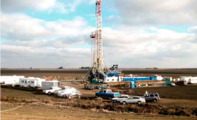 Photo of the drilling of the Citizen Green well on King Island, California, adjacent to Rindge Tract, as part of the WestCarb regional sequestration partnership which preceded the CarbonSAFE initiative. Data from the Citizen Green well was key in evaluating the CO2 storage potential of the southern Sacramento Basin and establishing it as a promising place for CO2 storage. 