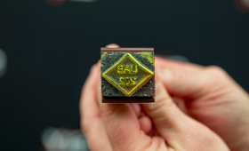 The diamond-shaped stamp used at the Y-12 National Security Complex to certify the First Production Unit of the W80-4 canned subassembly, a key milestone in the Life Extension Program.