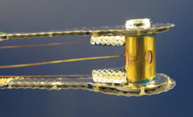 Target assembly developed by LLNL researchers, ready for an experiment at the National Ignition Facility to measure nuclear reactions in high-energy-density plasma environments. The assembly includes a capsule doped with radioactive material (located inside the cylindrical hohlraum). 