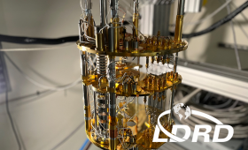 The LLNL team precisely measured plutonium-241 beta decays to search for production of exotic heavy neutrinos, a warm dark matter candidate, to explain the missing mass of the universe. The photograph shows a dilution refrigerator used to cool the experiment to 0.01 Kelvin