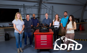 Lawrence Livermore National Laboratory’s Collaborative Heavy-lift Aerial unManned Propellor Systems (CHAMPS) team participated in the Defense Advanced Research Projects Agency’s Lift Challenge held in Dayton, Ohio. CHAMPS team left to right: Claire Knight, James Reimer, Marcus Worsley, Brian Wihl, Giovanna Bucci, Kenneth Entrom and Erika Ramos. Additional team members include Marissa Wood, Afolabi Olayiwola and Victoria Trang. (Photo: Garry McLeod/LLNL)