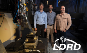 Lawrence Livermore National Laboratory researchers (from left) data scientist Michael Zelinski, engineer Hamed Ziad Ammar and principal investigator Brian Giera stand beside the direct-ink writing 3D printer used to collect data for a camera-based inspection system that uses AI and machine learning to measure part quality during printing.