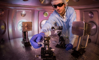 Researcher working with Jupiter laser